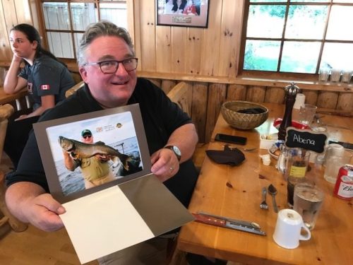 Aikens presented Tony Abena with a glossy 8 x 10 photo of his trophy lake trout