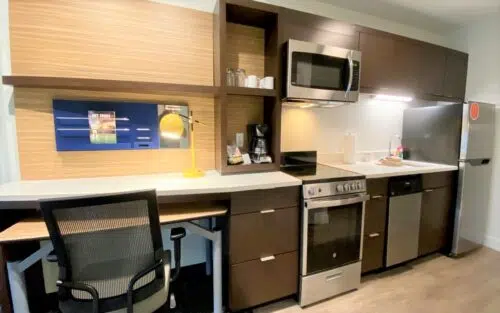 townplace suites by orlando aiport room kitchen area